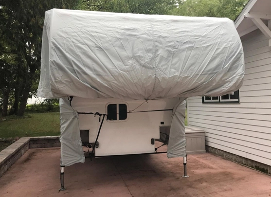 Why do RVs and trailers need special covers?
